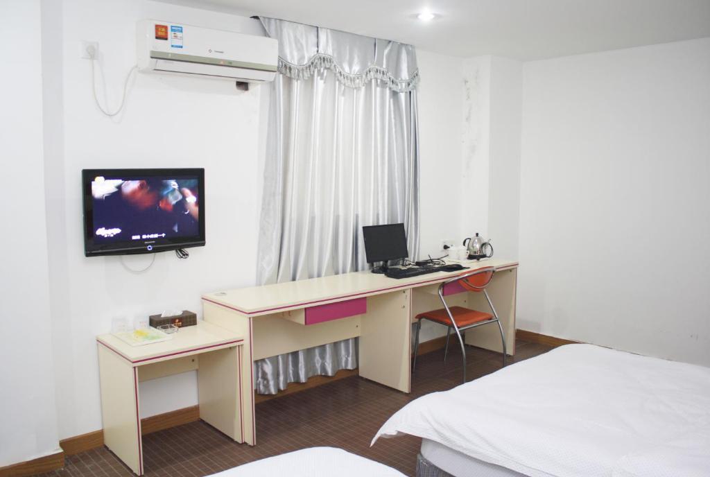 Guangyue Hotel Kanton Zimmer foto